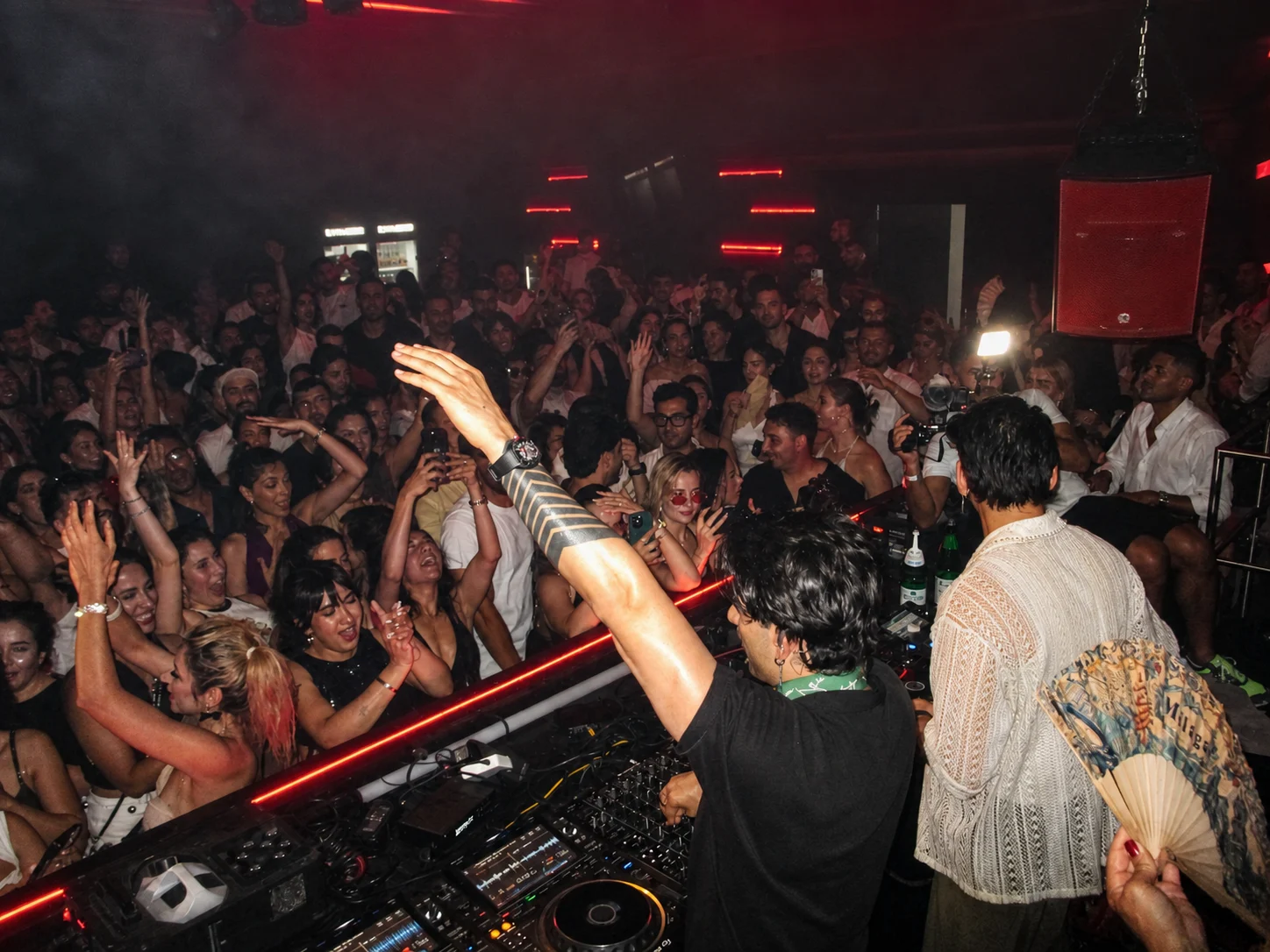 Vessbroz performing live for a packed crowd